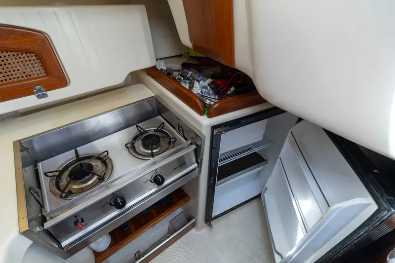 Slide: The Image of Compact kitchen in 2011 Hake Seaward 32 RK sailboat with stove and fridge. - 40