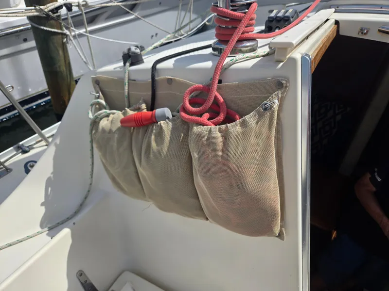 Slide: The Image of Mesh storage pockets on a 2011 Hake Seaward 32 RK sailboat deck. - 8