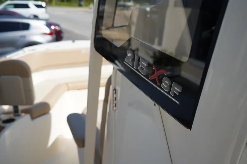 Slide: The Image of 2022 Scout 215 XSF boat interior with model emblem in focus. - 33