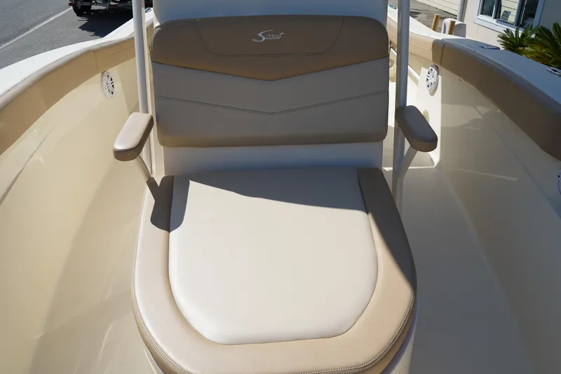 Slide: The Image of 2022 Scout 215 XSF boat seat with beige upholstery and armrests. - 34