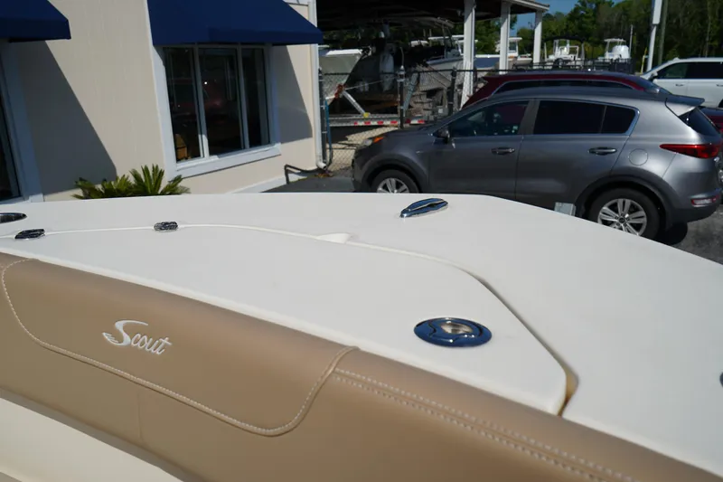 Slide: The Image of 2022 Scout 215 XSF boat detail with beige seating and chrome accents. - 39