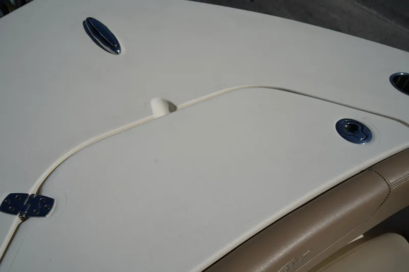 Slide: The Image of 2022 Scout 215 XSF boat deck with sleek design and hardware details. - 40