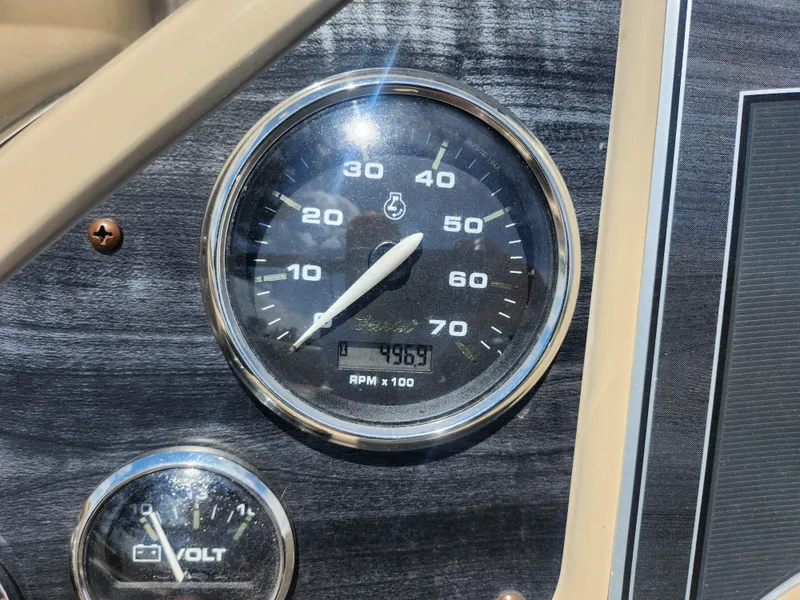 Slide: The Image of Close-up of 2018 Sweetwater 2086 C speedometer and voltmeter on dashboard. - 21