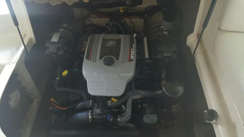 Slide: The Image of Engine compartment of a 2008 Sea Ray 240 Sundeck boat. - 11