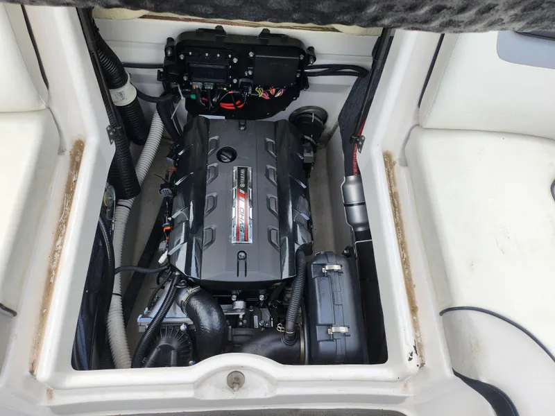 Slide: The Image of 2017 Yamaha Boats SX195 engine compartment showcasing powerful marine engine components. - 23