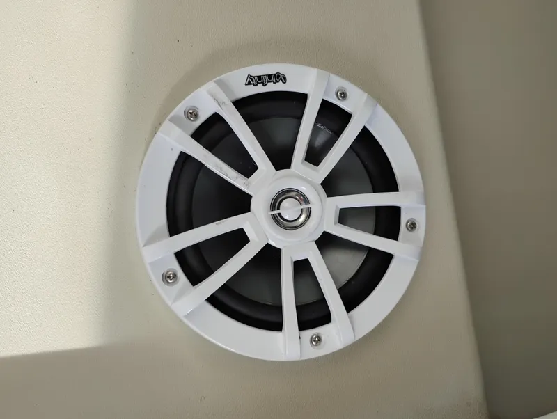 Slide: The Image of White marine speaker on 1989 Boston Whaler 22 Renegade Cabin boat interior. - 20