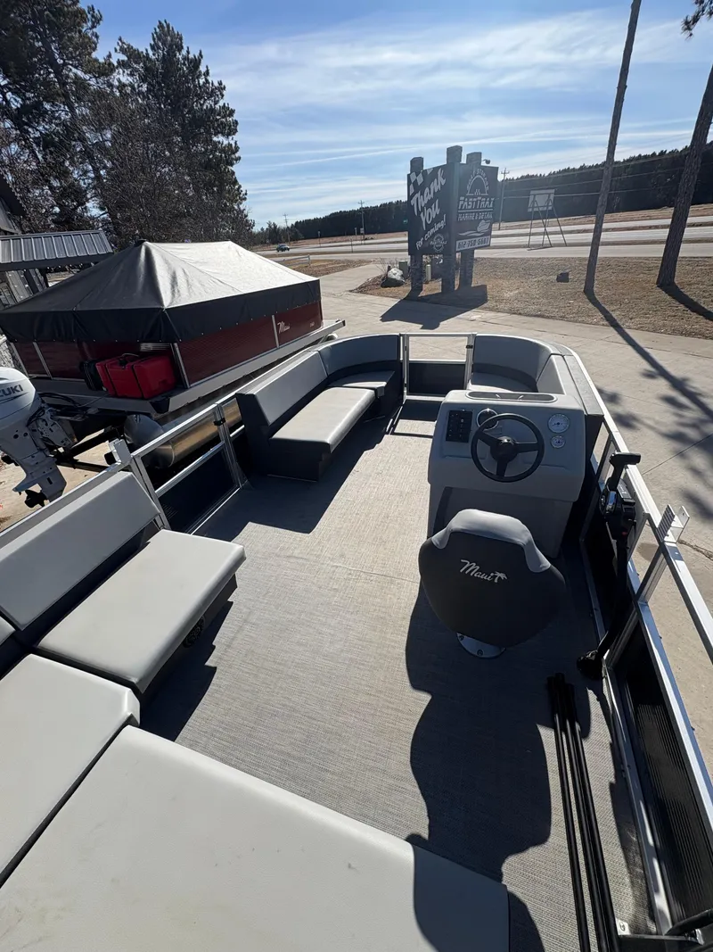 Slide: The Image of 2025 Custom Pontoon 160 Cruise boat with spacious seating and modern steering console. - 11