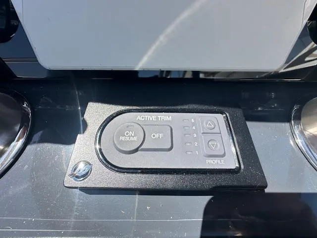 Slide: The Image of Active trim control panel on 2018 Formula 270 Bowrider boat dashboard. - 20