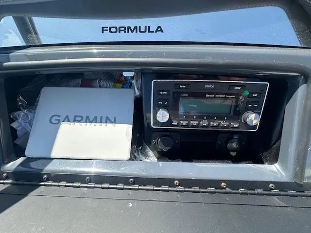 Slide: The Image of 2018 Formula 270 Bowrider dashboard with Garmin navigation and stereo system. - 22