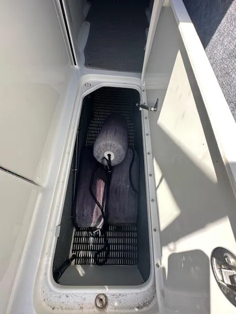 Slide: The Image of 2018 Formula 270 Bowrider storage compartment with fender and accessories. - 25