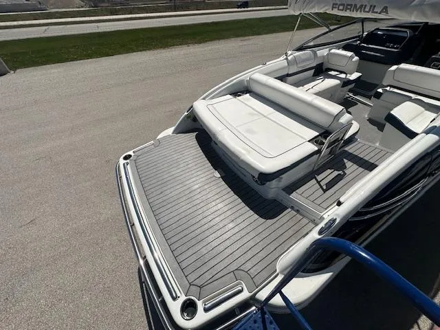 Slide: The Image of 2018 Formula 270 Bowrider boat with spacious seating and sleek design. - 3