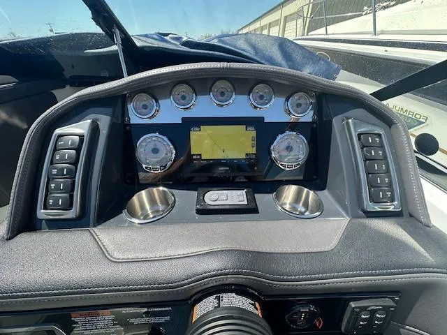 Slide: The Image of Dashboard of a 2018 Formula 270 Bowrider boat with gauges and navigation screen. - 6