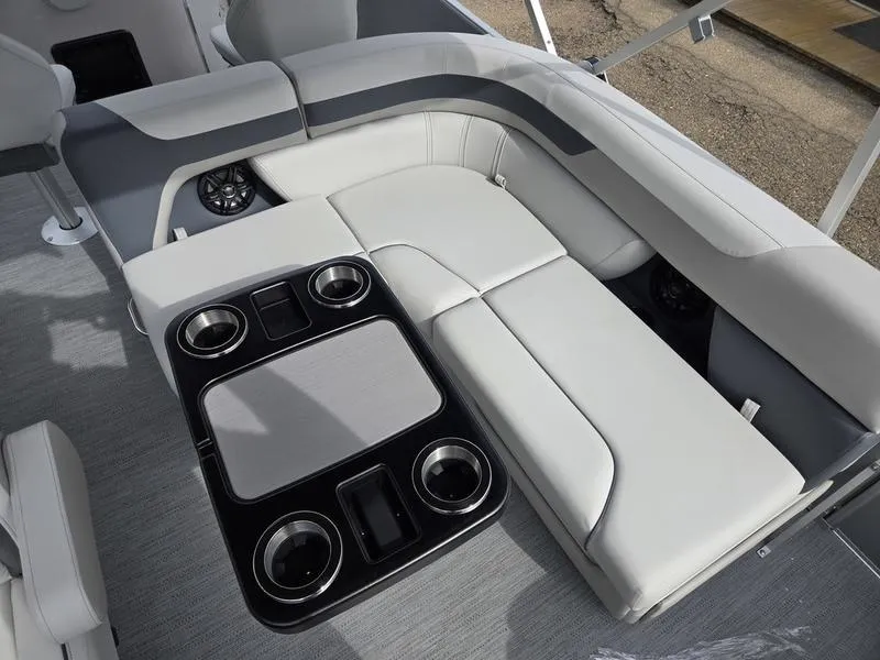 Slide: The Image of Luxurious seating area on 2025 Godfrey Sweetwater 2286 FS pontoon boat with cup holders. - 10