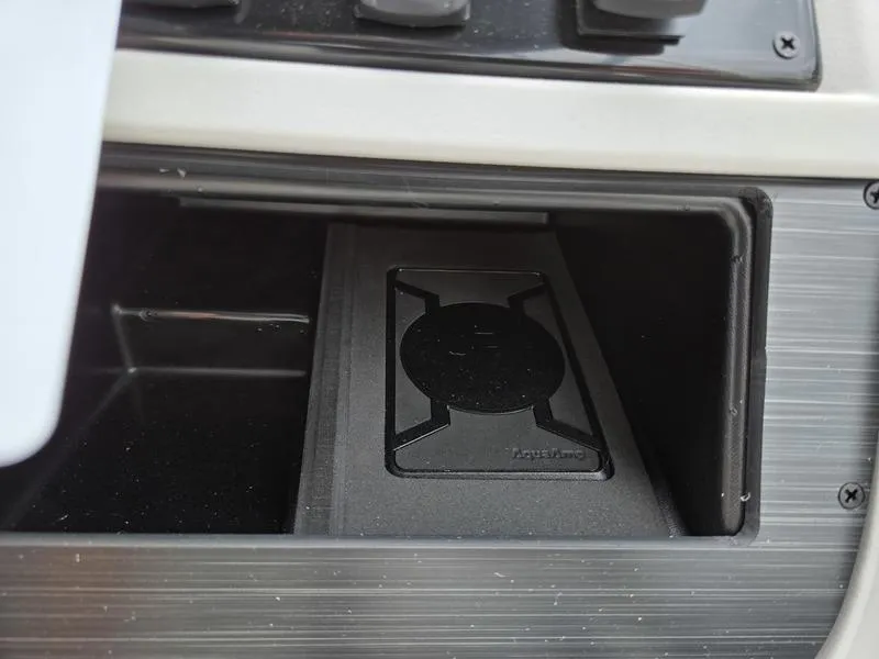 Slide: The Image of Storage compartment in 2025 Godfrey Sweetwater 2286 FS boat, featuring a secure latch. - 14