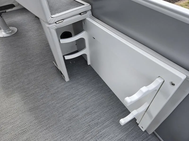 Slide: The Image of Interior of 2025 Godfrey Sweetwater 2286 FS boat, featuring storage compartments and seating. - 17
