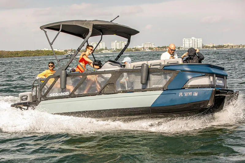 Slide: The Image of 2024 Sea-Doo Switch® Cruise 18 on water, featuring 170 hp engine, with passengers enjoying the ride. - 9
