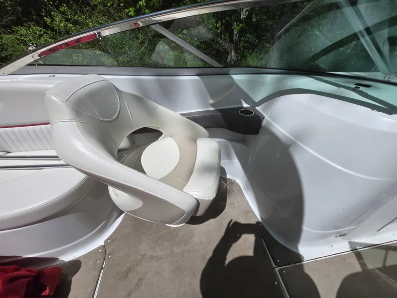 Slide: The Image of White interior of 2009 Azure AZ298 boat with swivel seat and windshield. - 14