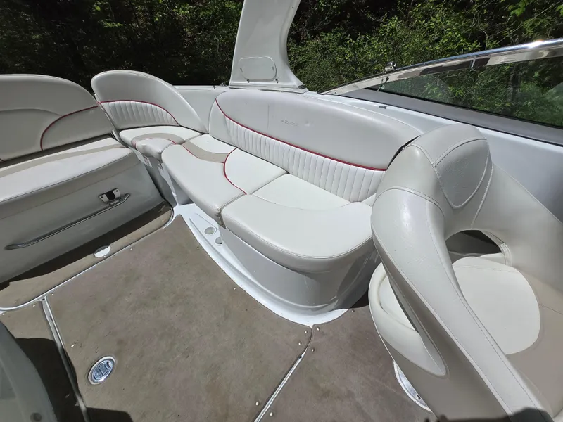 Slide: The Image of 2009 Azure AZ298 boat interior with white leather seating and carpeted floor. - 22