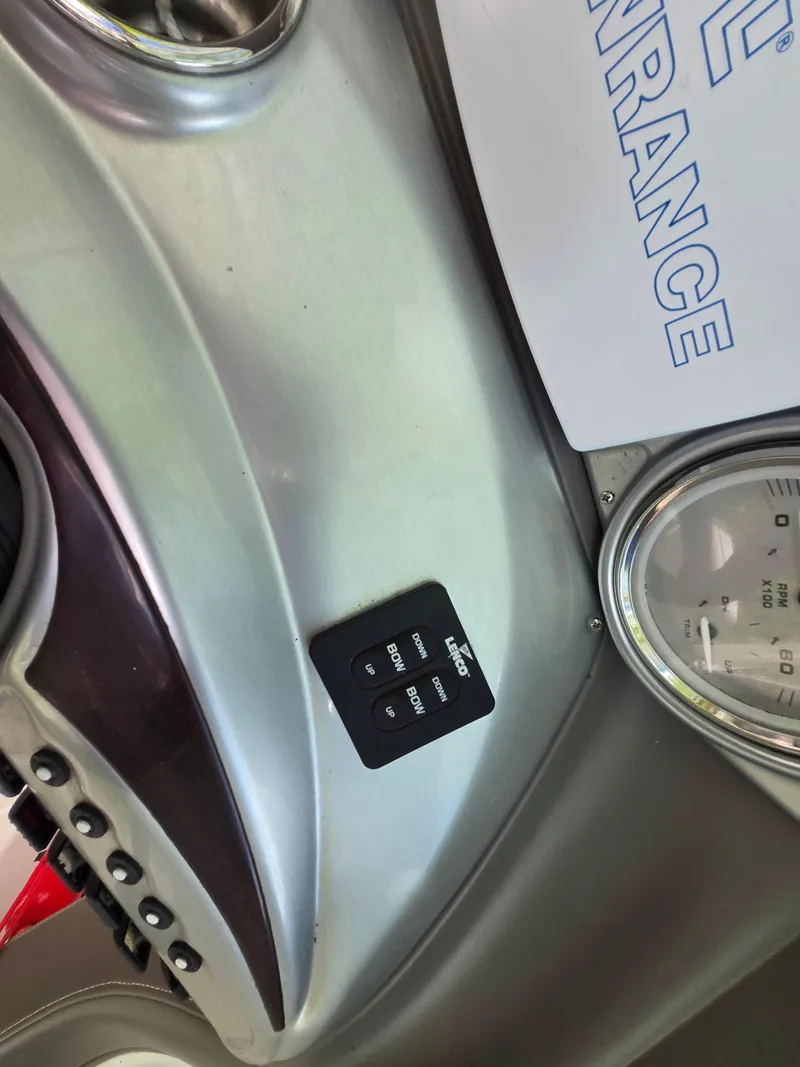 Slide: The Image of Dashboard of a 2009 Azure AZ298 boat with control panel and gauges. - 26