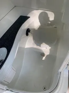 Slide: The Image of Compact bathroom in 2009 Azure AZ298 boat with toilet and sink. - 38