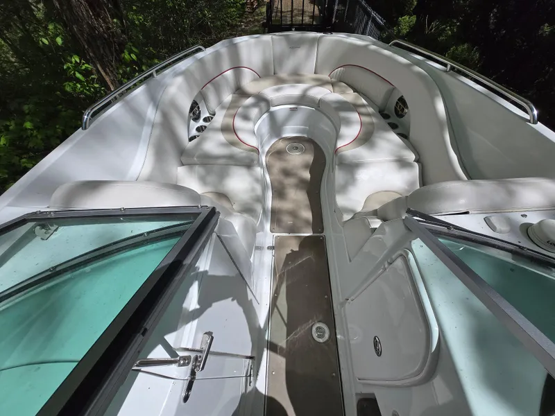 Slide: The Image of 2009 Azure AZ298 boat interior with white seating and open deck. - 4