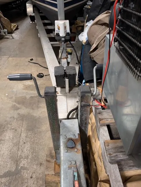 Slide: The Image of Boat trailer with winch system for 2010 Mainship Pilot 31 in a storage area. - 24