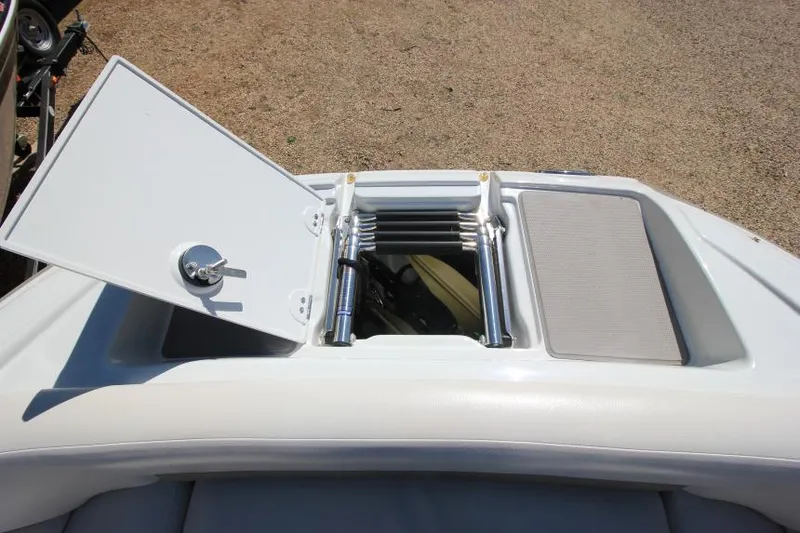 Slide: The Image of 2016 Crownline Eclipse E2 boat with open hatch and ladder on deck. - 22