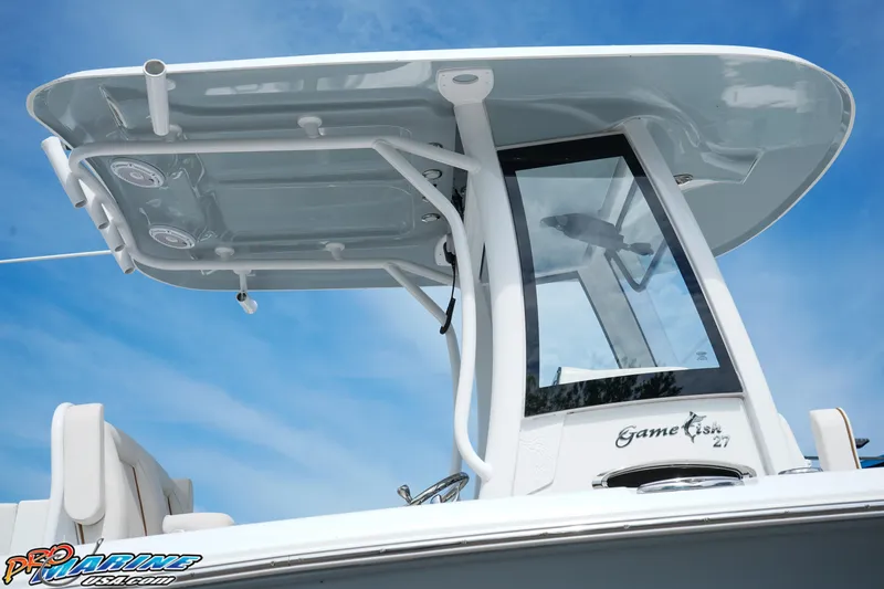 Slide: The Image of 2022 Sea Hunt GAMEFISH 27 CB boat with sleek T-top and modern design. - 21
