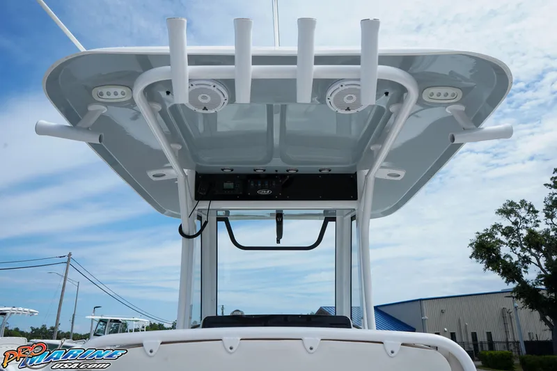Slide: The Image of 2022 Sea Hunt GAMEFISH 27 CB boat with T-top and rod holders. - 34