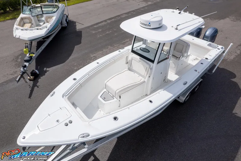 Slide: The Image of 2022 Sea Hunt GAMEFISH 27 CB boat on trailer, aerial view. - 4