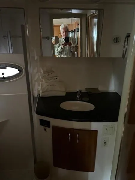 Slide: The Image of Bathroom interior of 2005 Carver Mariner 360 yacht with mirror and sink. - 11