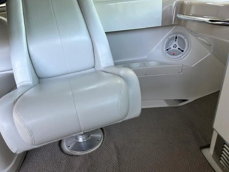 Slide: The Image of 2005 Carver Mariner 360 interior with white leather seat and speaker. - 14