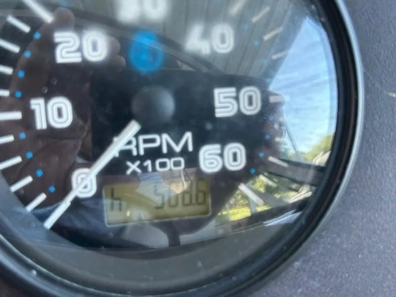 Slide: The Image of Close-up of a 2005 Carver Mariner 360 RPM gauge showing 508.6 hours. - 9