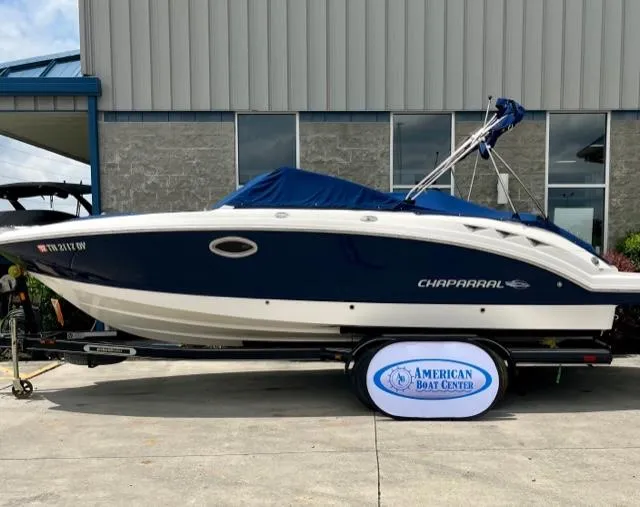 Slide: The Image of 2009 Chaparral Sunesta 244 boat on trailer at American Boat Center. - 0