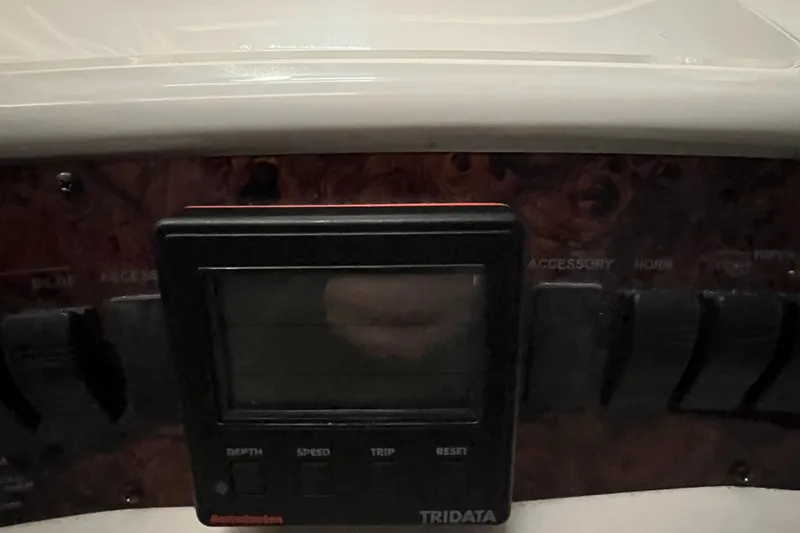Slide: The Image of Control panel of a 1996 Sea Ray 330 Sundancer boat with Tridata display. - 16