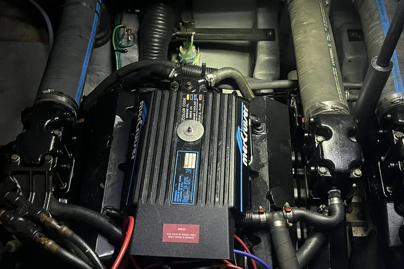 Slide: The Image of Engine compartment of a 1996 Sea Ray 330 Sundancer with MerCruiser components. - 41