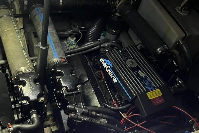 Slide: The Image of Engine compartment of a 1996 Sea Ray 330 Sundancer with MerCruiser components. - 43