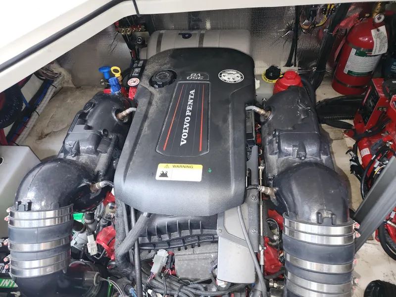 Slide: The Image of Engine compartment of 2023 Regal 28 Express with Volvo Penta engine. - 12