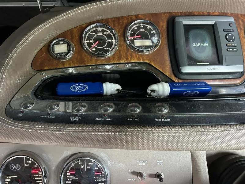 Slide: The Image of Dashboard of a 2010 Cobalt 302 boat with Garmin GPS and gauges. - 22