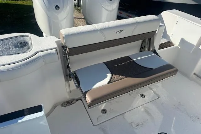 Slide: The Image of 2025 Tidewater 272 CC Adventure boat seat, featuring sleek design and comfortable upholstery. - 14
