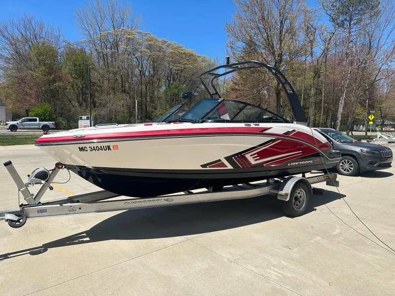 Slide: The Image of 2016 Chaparral Vortex 203 VRX boat on trailer, parked outdoors. - 1