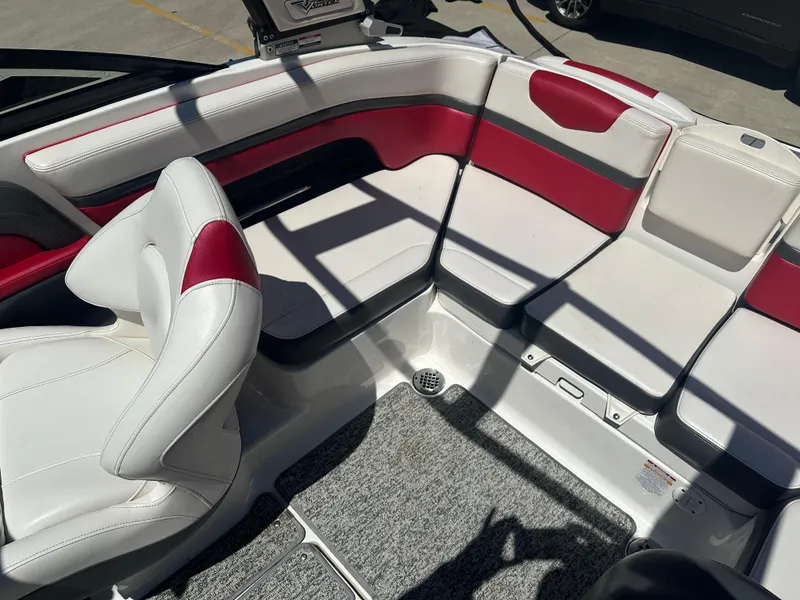 Slide: The Image of 2016 Chaparral Vortex 203 VRX boat interior with red and white seating. - 10