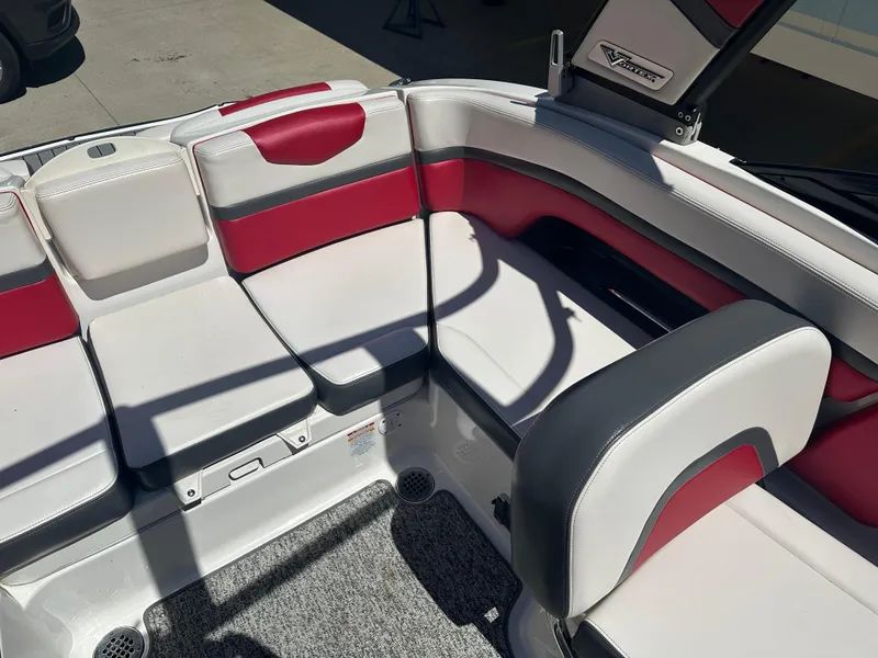 Slide: The Image of 2016 Chaparral Vortex 203 VRX boat interior with red and white seating. - 11