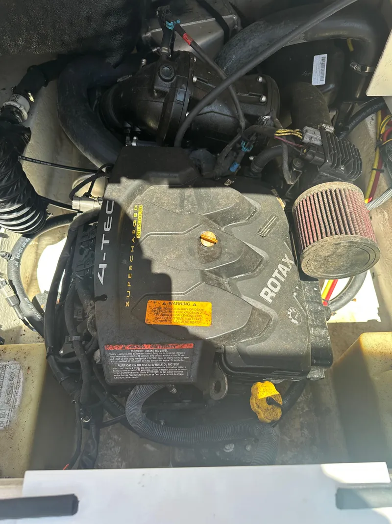 Slide: The Image of 2016 Chaparral Vortex 203 VRX engine compartment with visible components and wiring. - 17