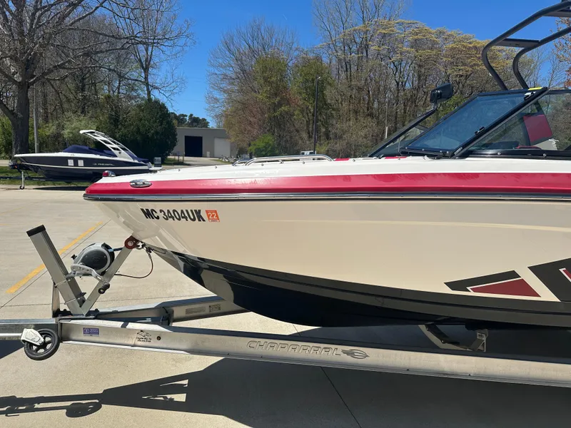 Slide: The Image of 2016 Chaparral Vortex 203 VRX boat on trailer in outdoor setting. - 4