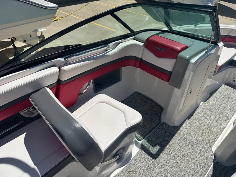 Slide: The Image of 2016 Chaparral Vortex 203 VRX boat interior with red and white seating. - 7