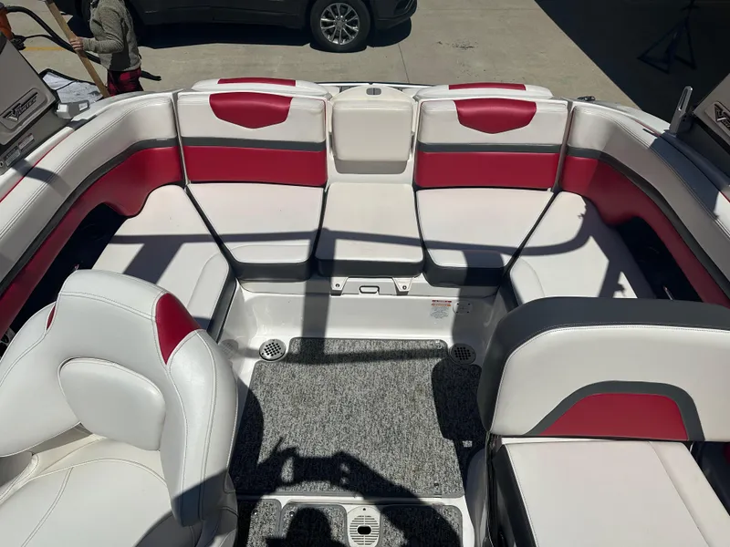 Slide: The Image of 2016 Chaparral Vortex 203 VRX boat interior with red and white seating. - 9