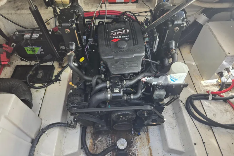 Slide: The Image of Engine compartment of a 2007 Sea Ray 260 Sundancer boat, featuring a MerCruiser 260 MAG MPI engine. - 2