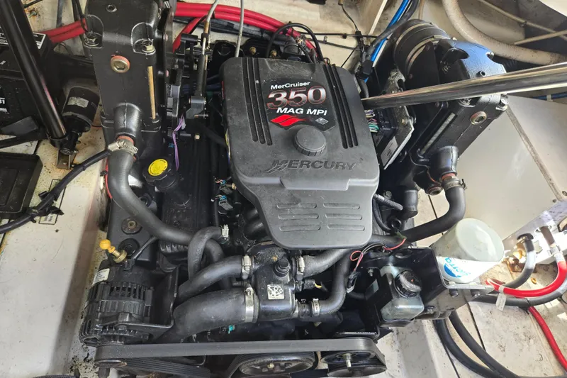 Slide: The Image of Engine of a 2007 Sea Ray 260 Sundancer boat, featuring a MerCruiser 350 MAG MPI. - 36
