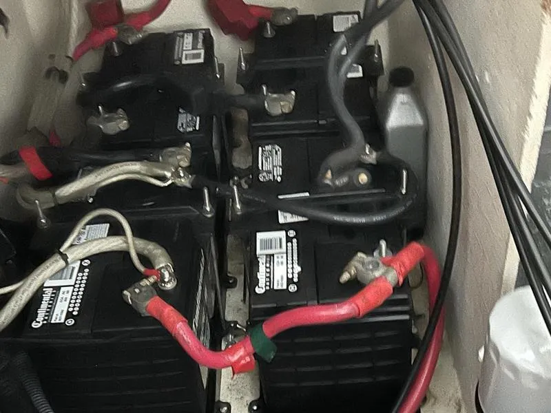 Slide: The Image of Batteries in a 2005 Sea Ray 320 Sun Dancer boat engine compartment. - 16
